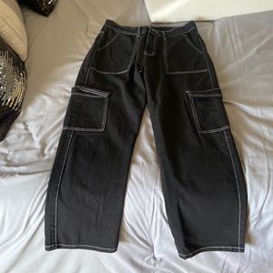 Faded black with white stitching cargo pants, missing pant button